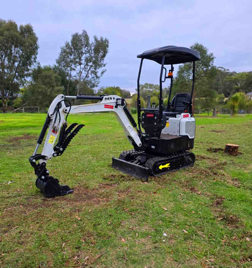 Kubota mini excavator digging on site