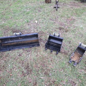 Mini excavator auger ready for post holes