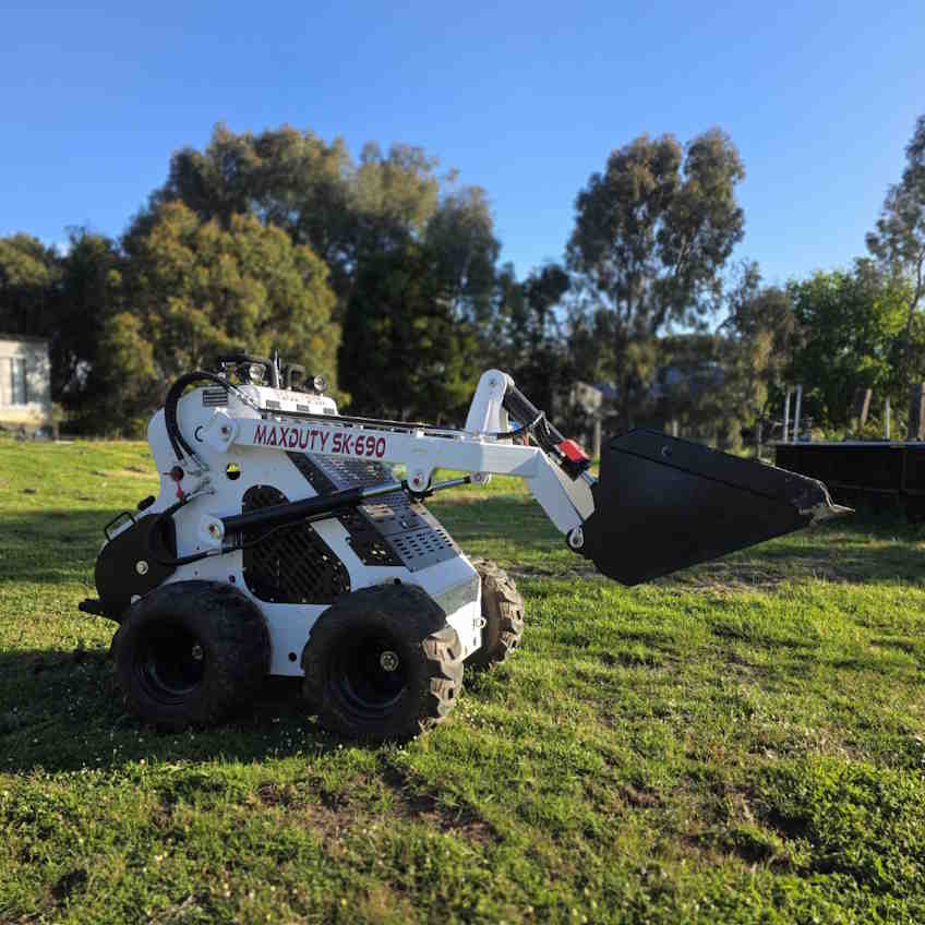SK690 Honda mini skid steer on trailer